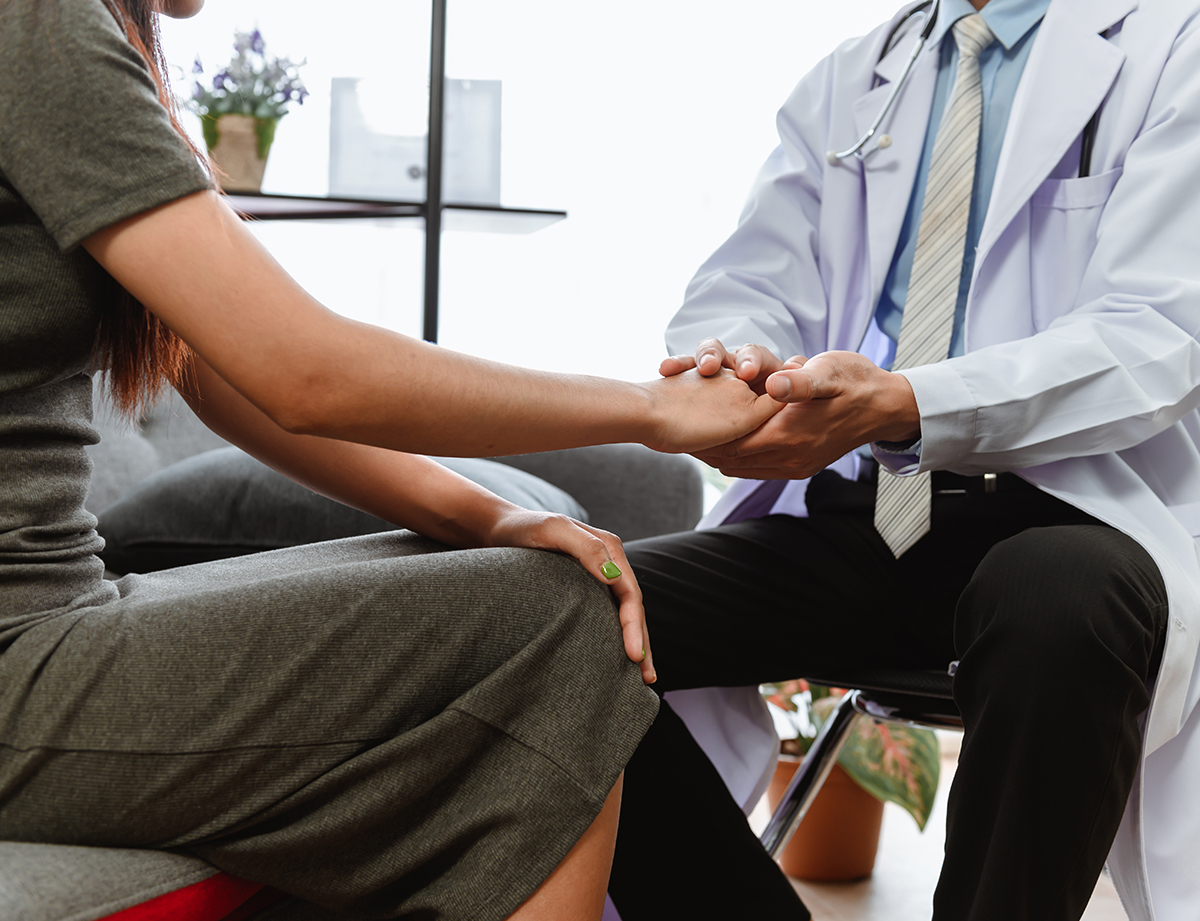 doctor comforting patient