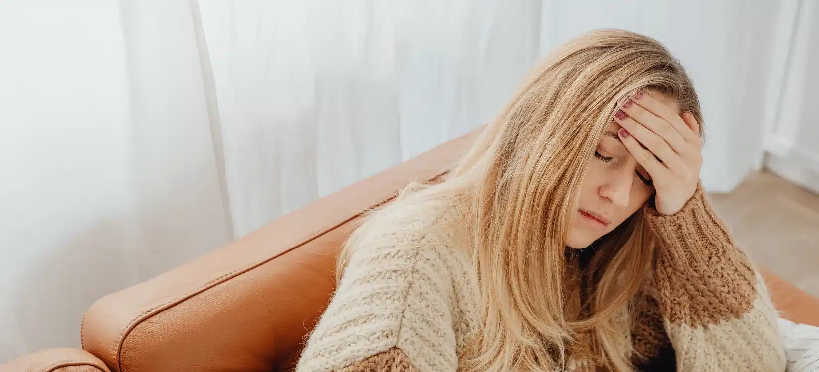 pots symptoms fatigue brain fog woman resting on couch